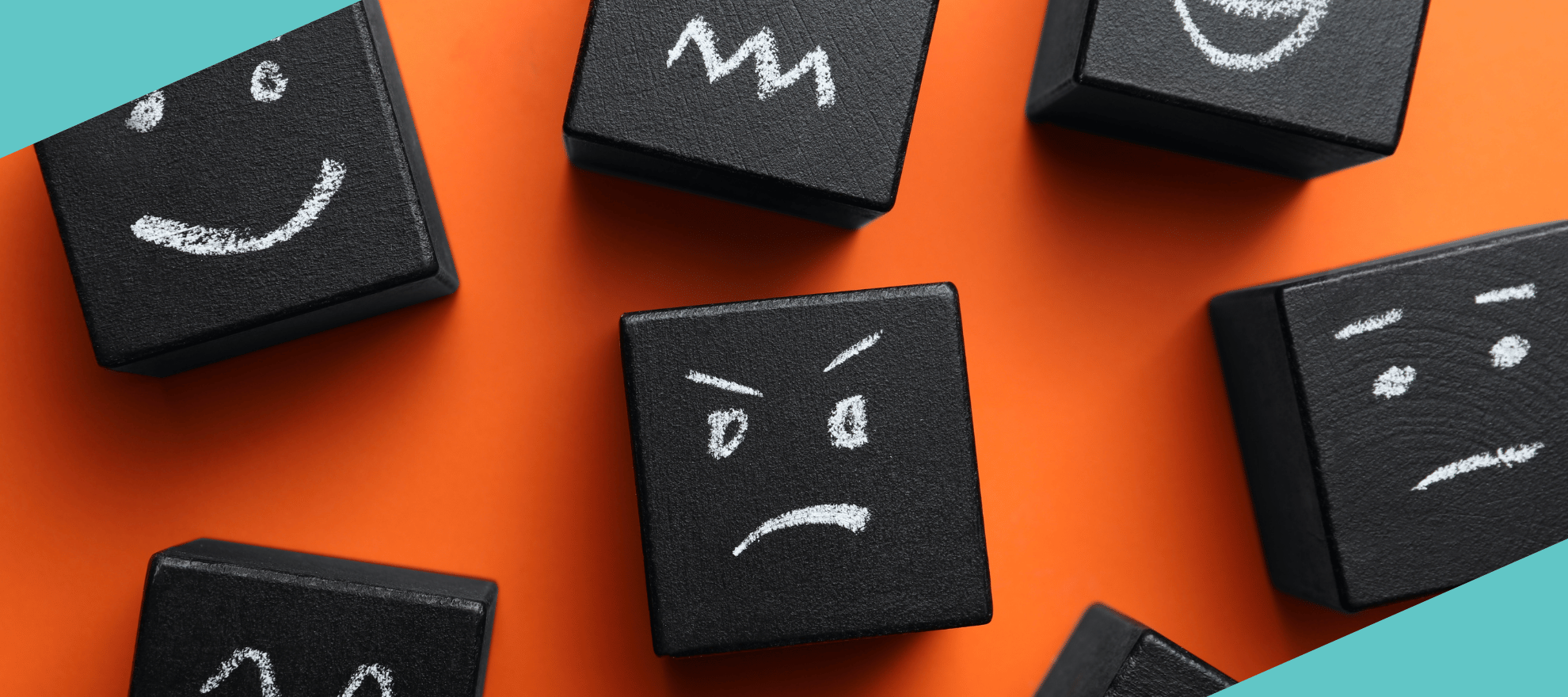 Würfel mit Gesichtern, die verschiedene Emotionen ausdrücken